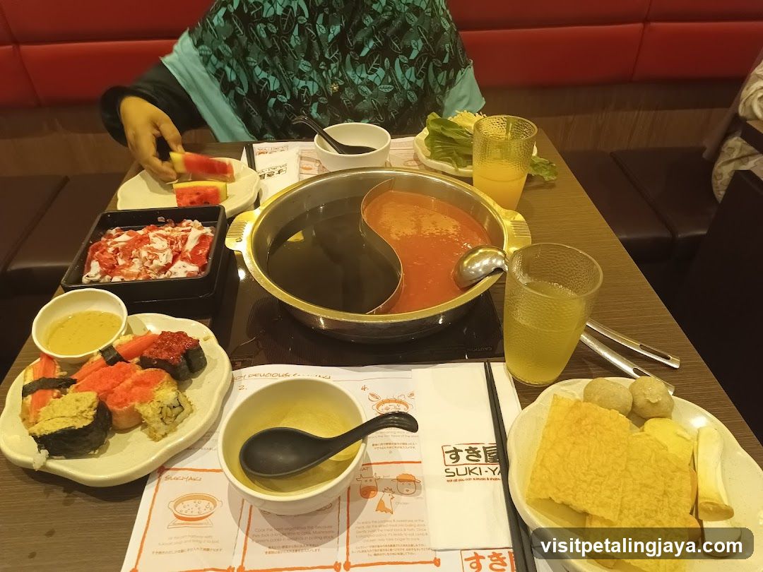 Sushi and Hot Pot Meal