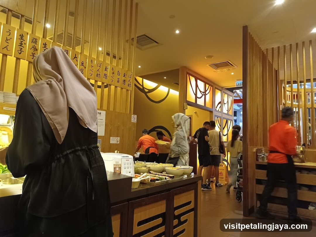 Restaurant Interior with Staff and Customers