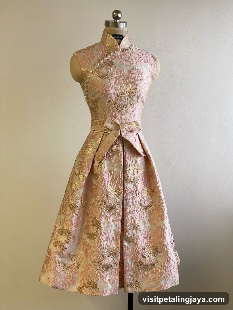 Pink and Gold Patterned Dress on Mannequin