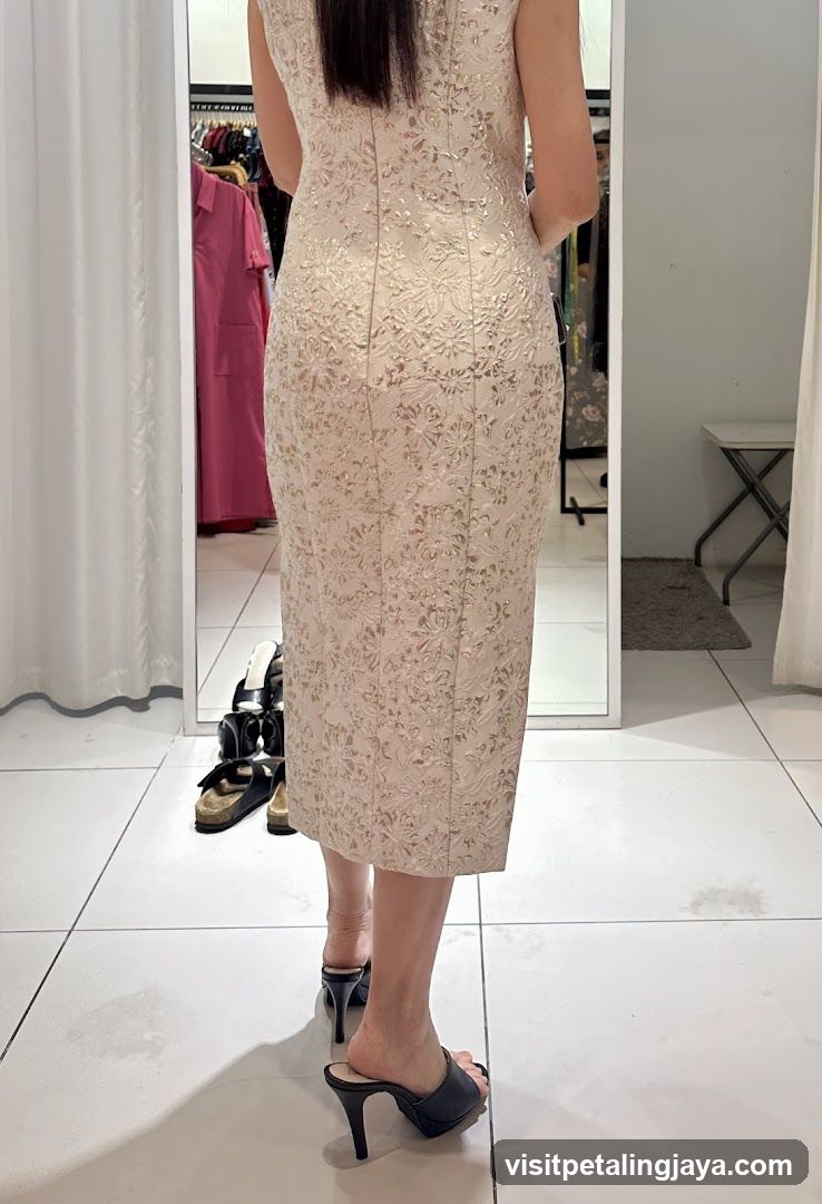 Woman in Lace Dress at Store
