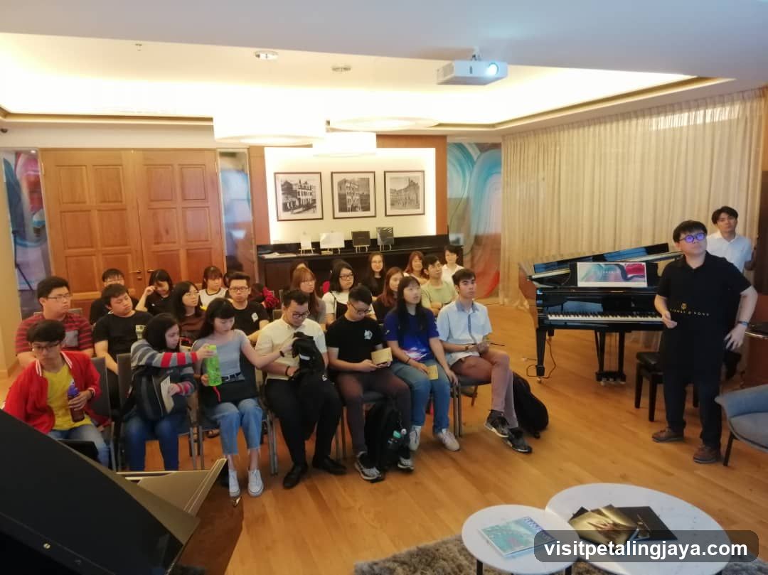 Group in a room with piano