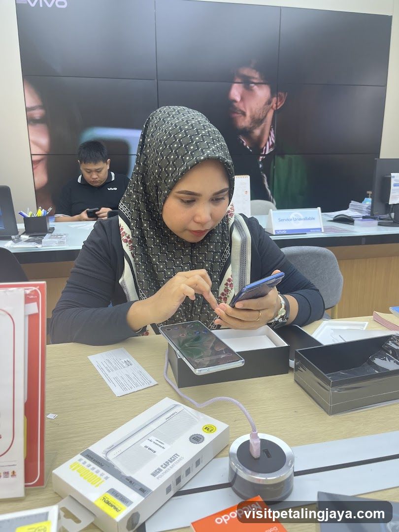 Woman Testing Smartphone in Store