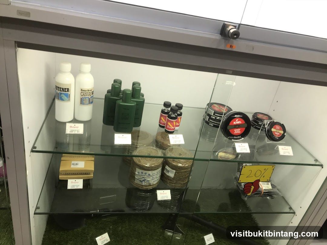 Display Case with Cleaning Supplies and Shoe Care Products