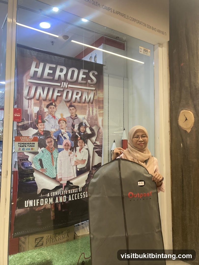 Woman holding a garment bag in front of a store window