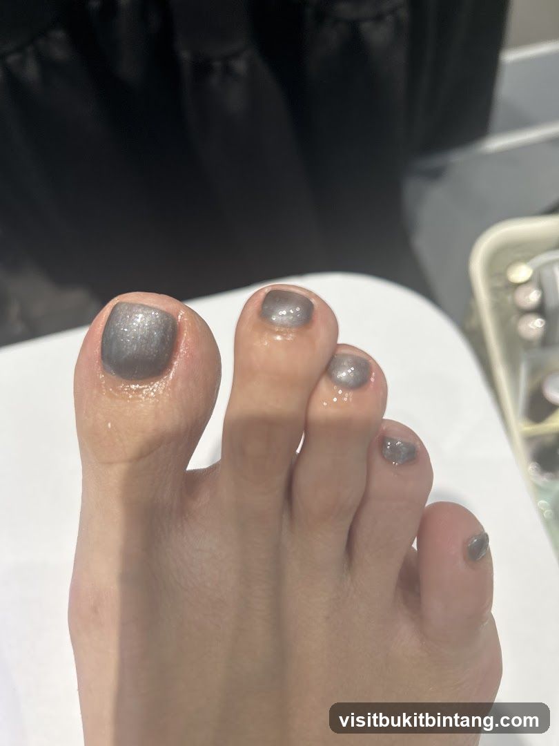 Toes with Grey Nail Polish