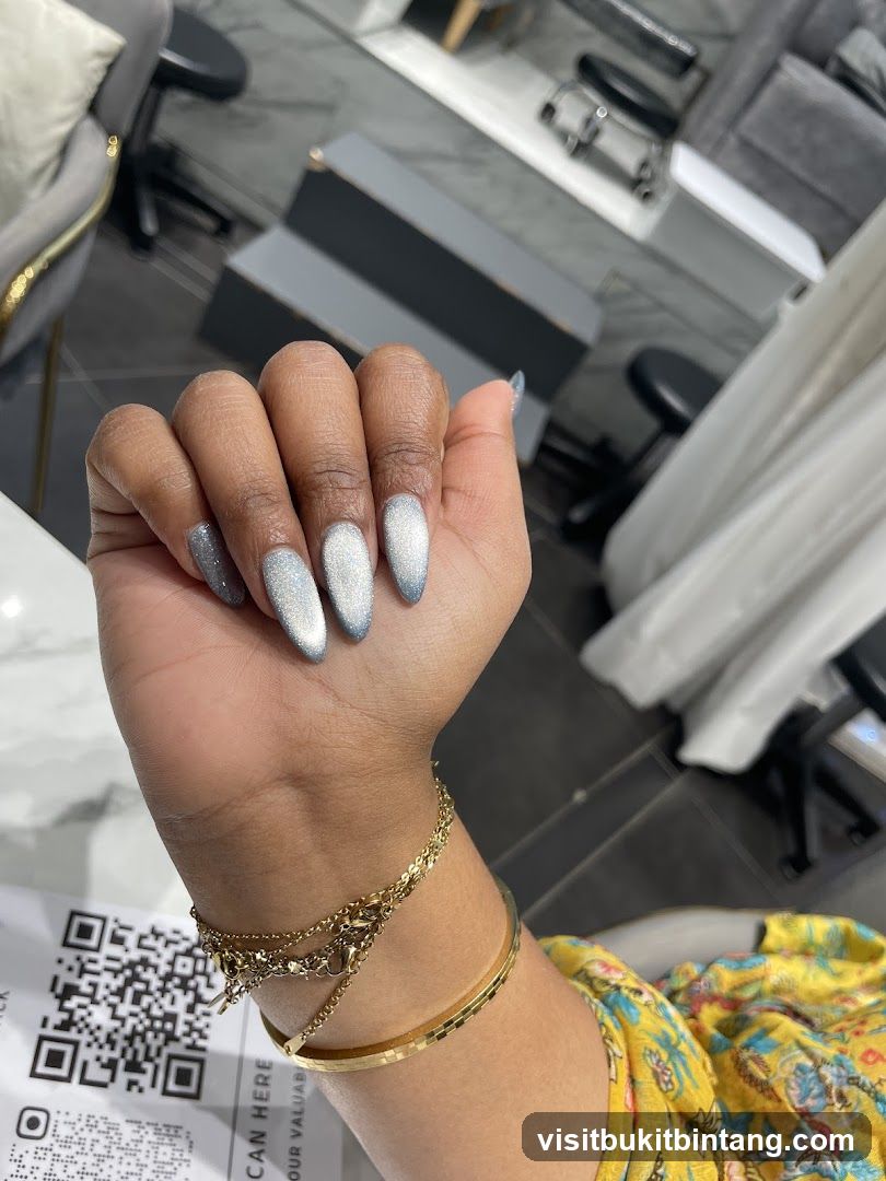 Woman's Hand with Glittery Nails