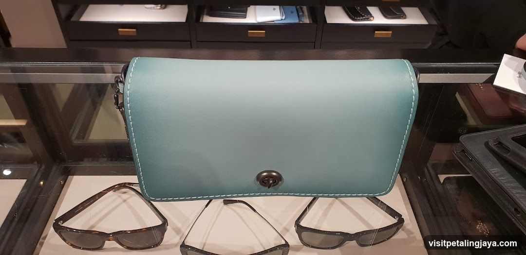 Blue Leather Handbag Display