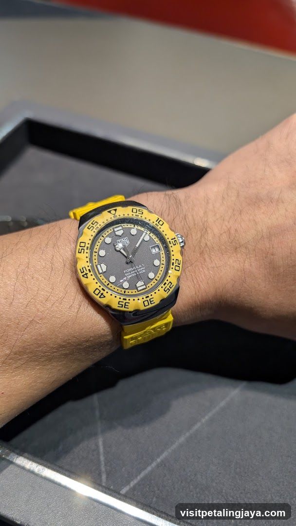 Yellow and Black Watch on Wrist