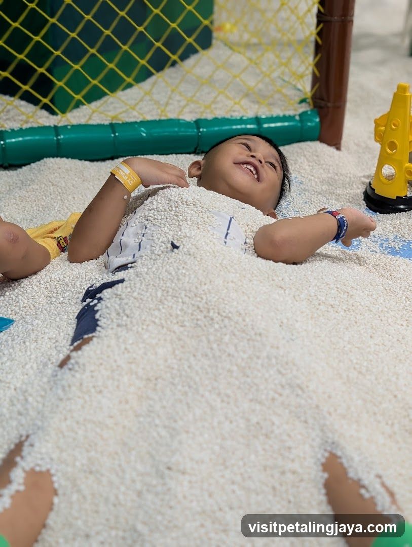 Child in Sand Pit