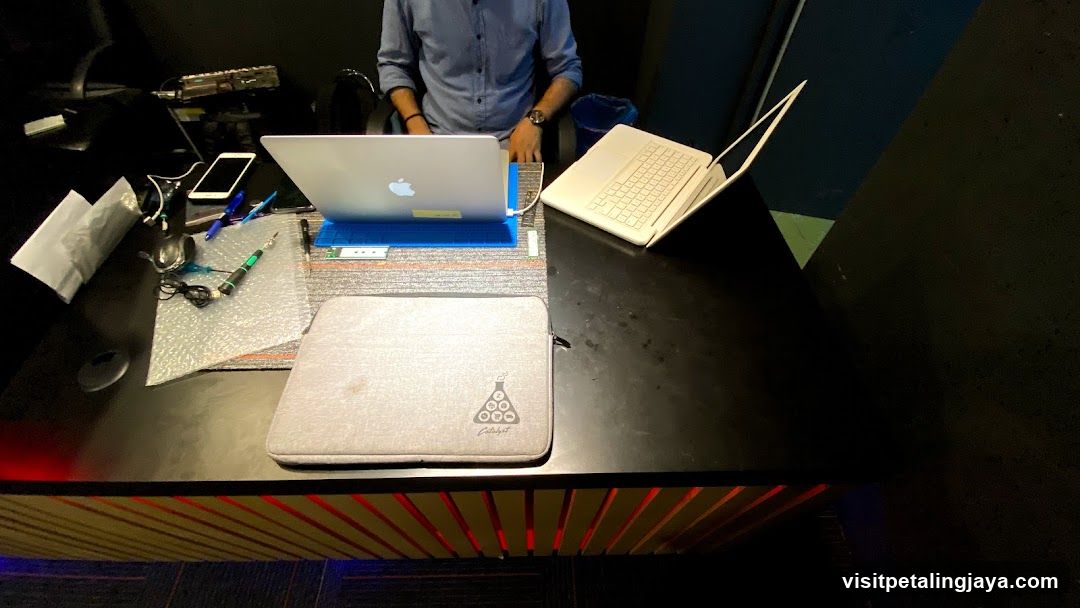 Desk Setup with Laptops and Accessories