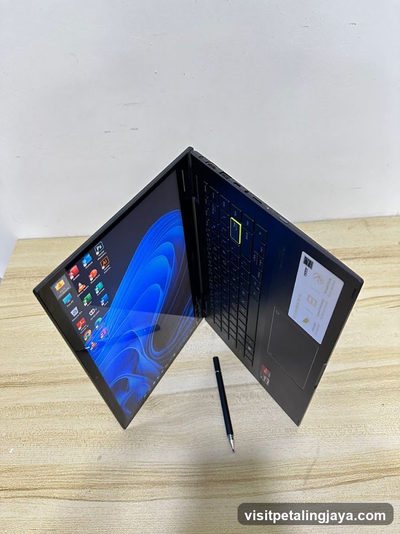 Laptop on table with stylus
