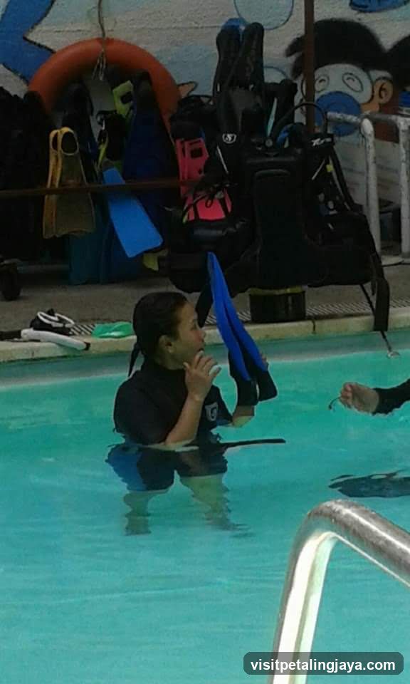 Diver in Pool with Gear