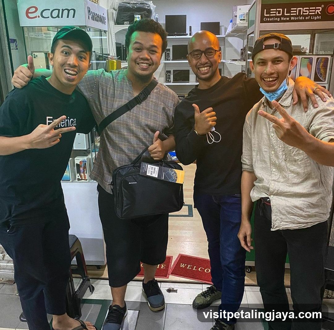 Group of men in electronics shop