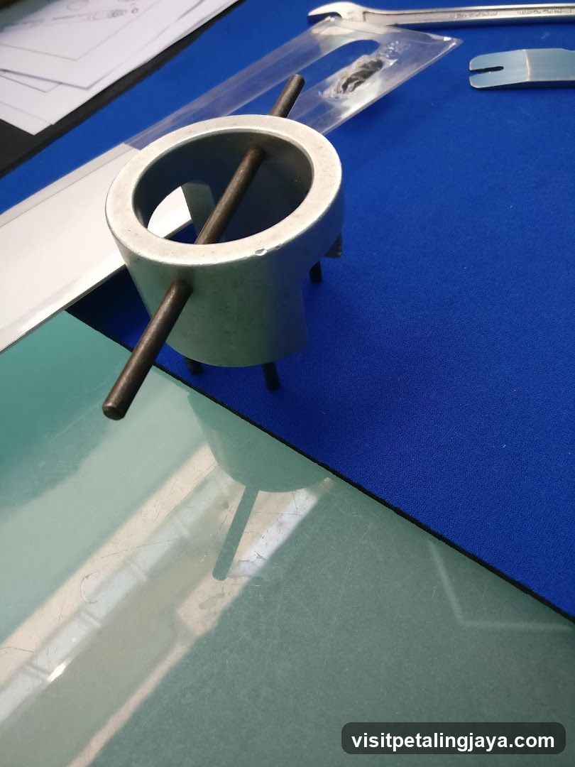 Metal Ring Component on Blue Mat