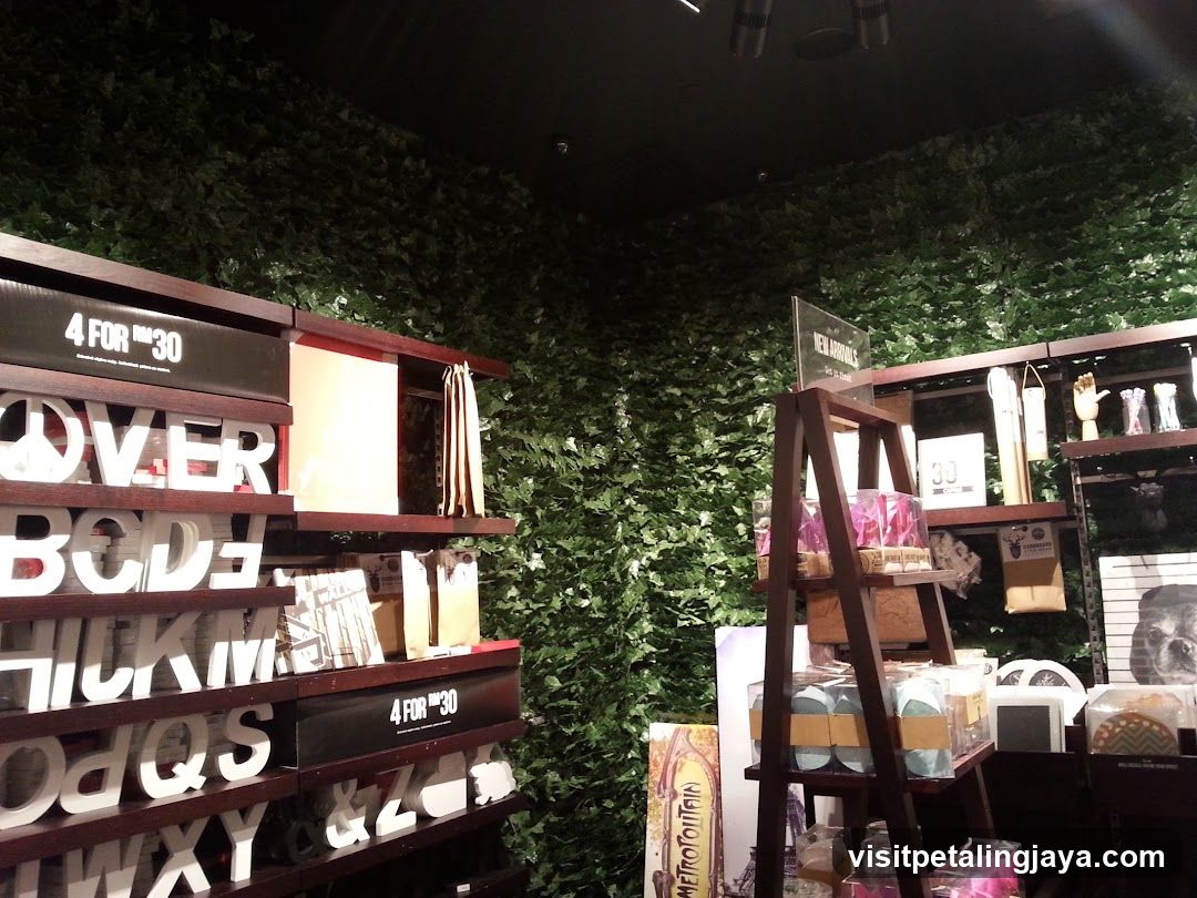 Interior Shop Display with Greenery Wall
