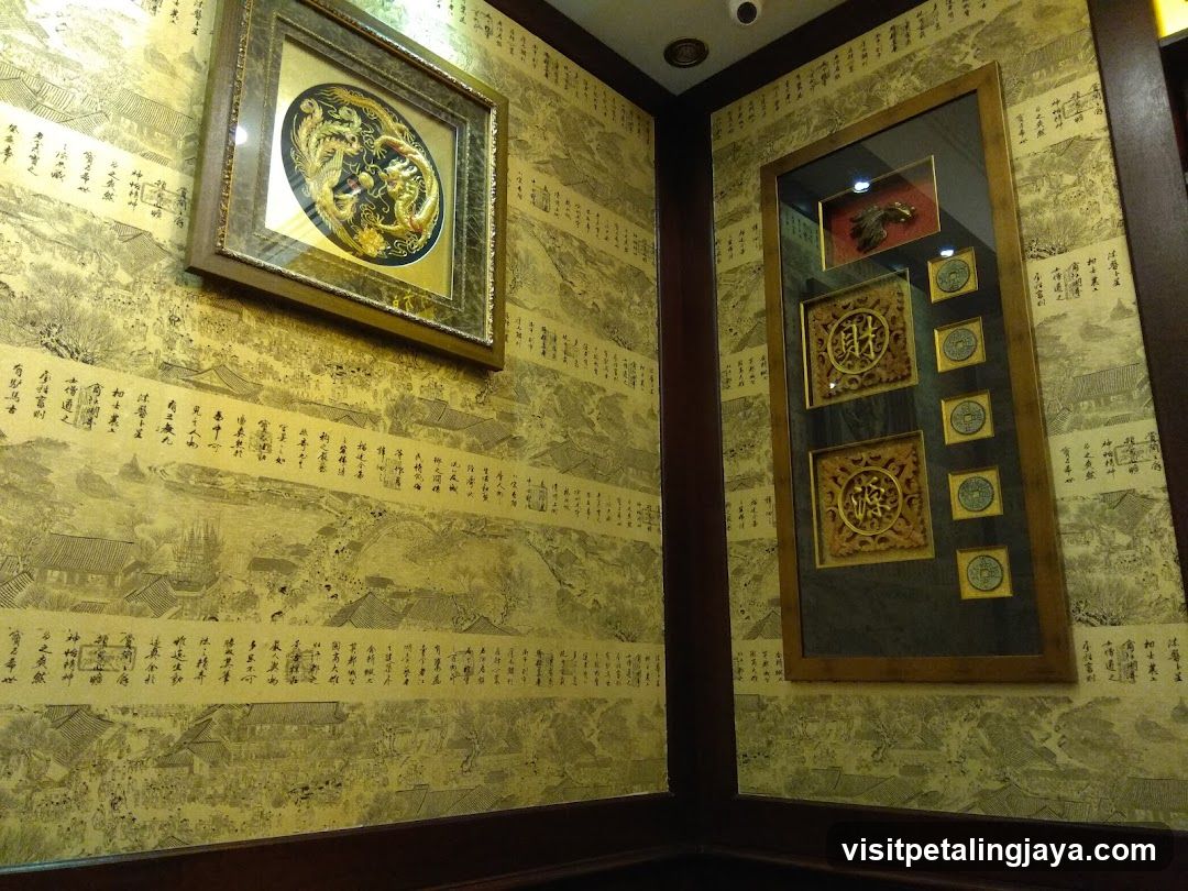 Decorated Interior Wall with Artwork and Framed Items