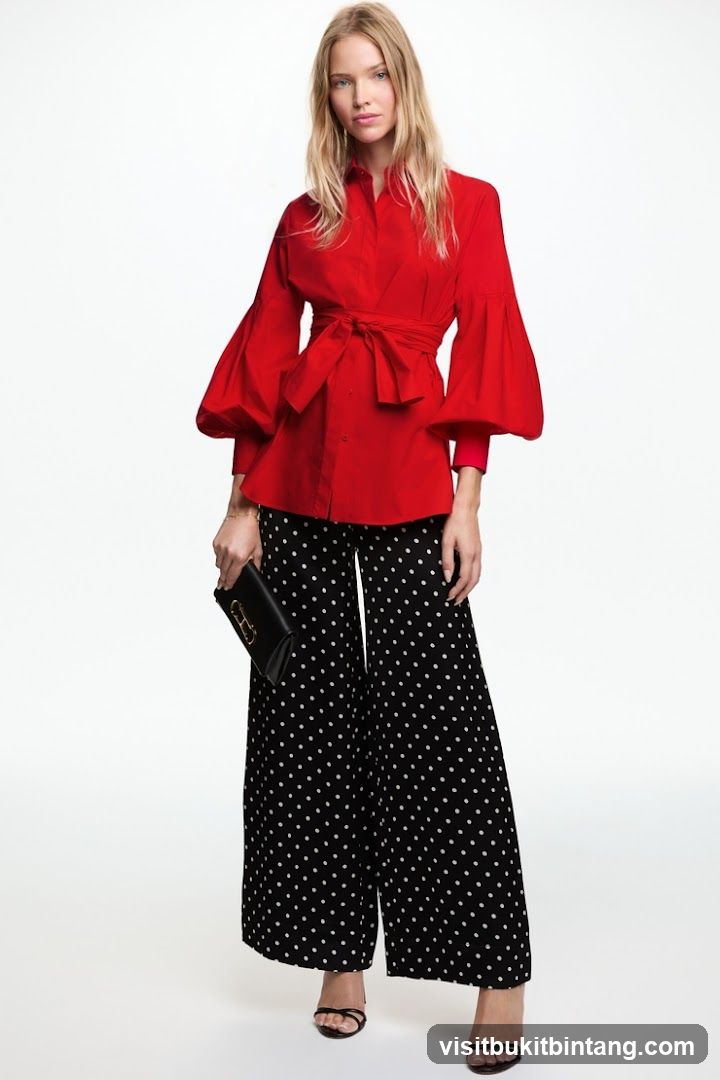 Woman in Red Blouse and Polka Dot Pants