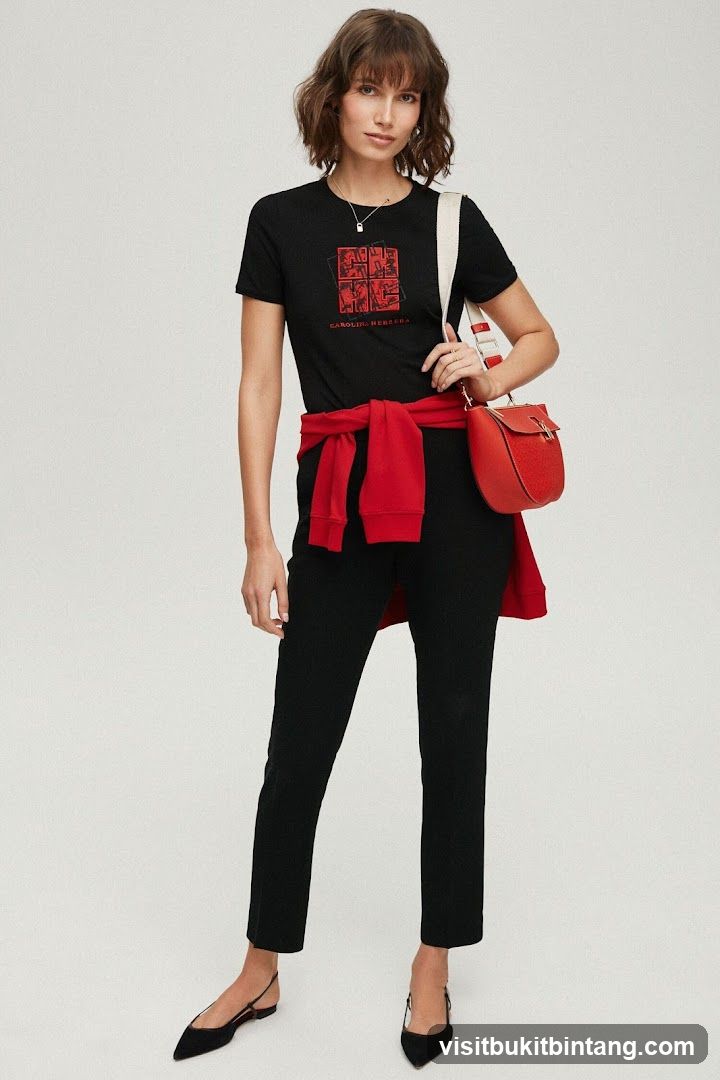 Woman wearing black t-shirt and pants