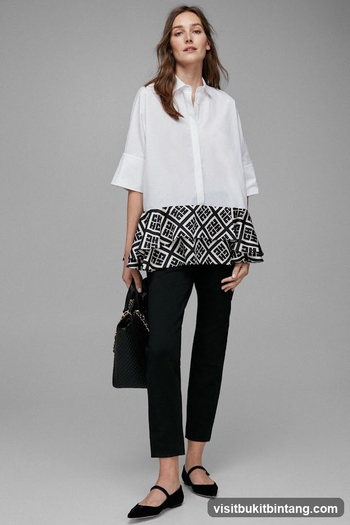 Woman in White Blouse and Black Pants
