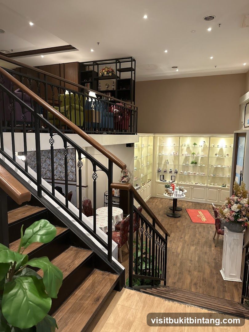 Interior of a store with a staircase and display shelves