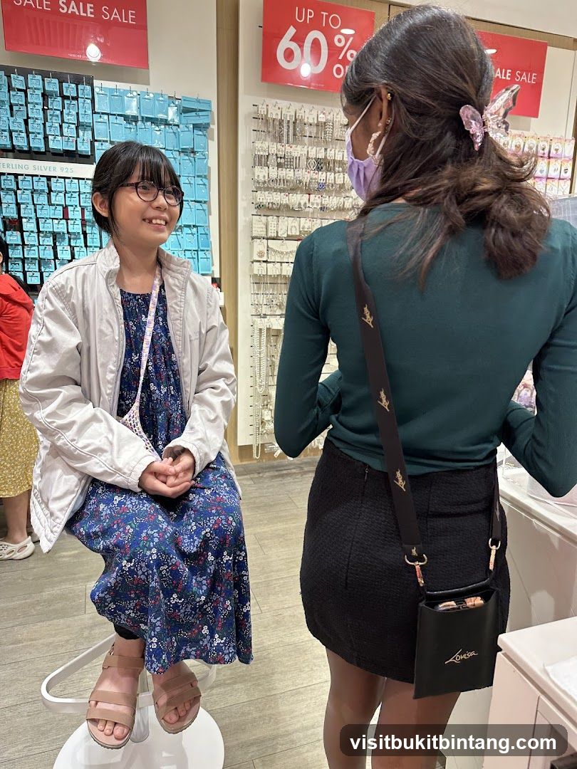 Two people in a jewelry store