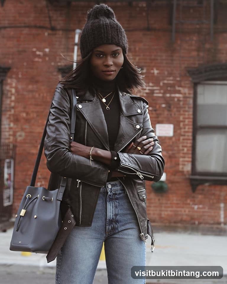 Woman in Leather Jacket and Beanie