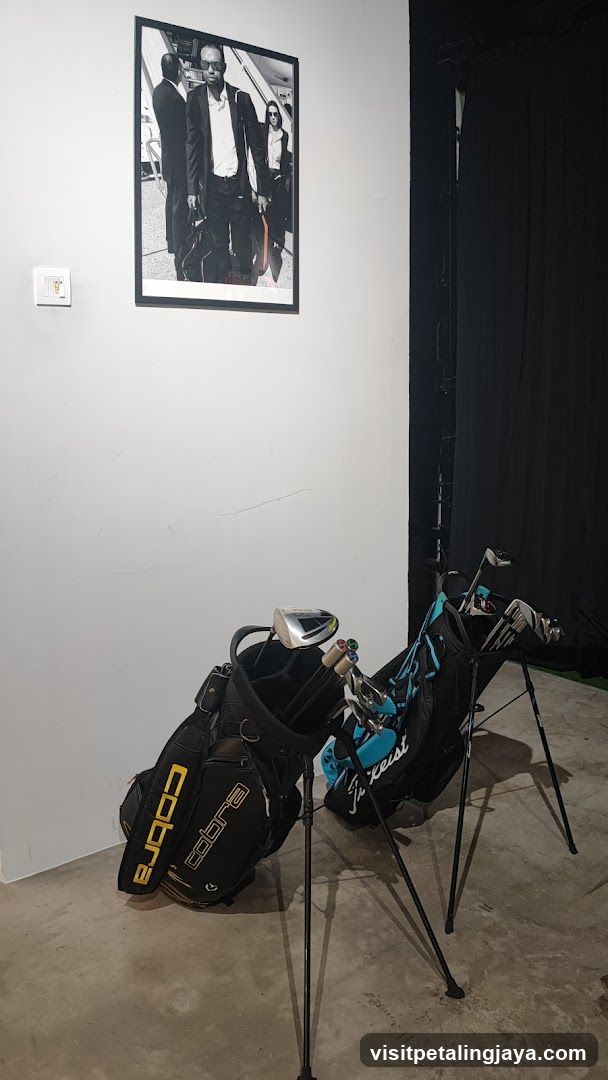 Golf Bags and Framed Photo