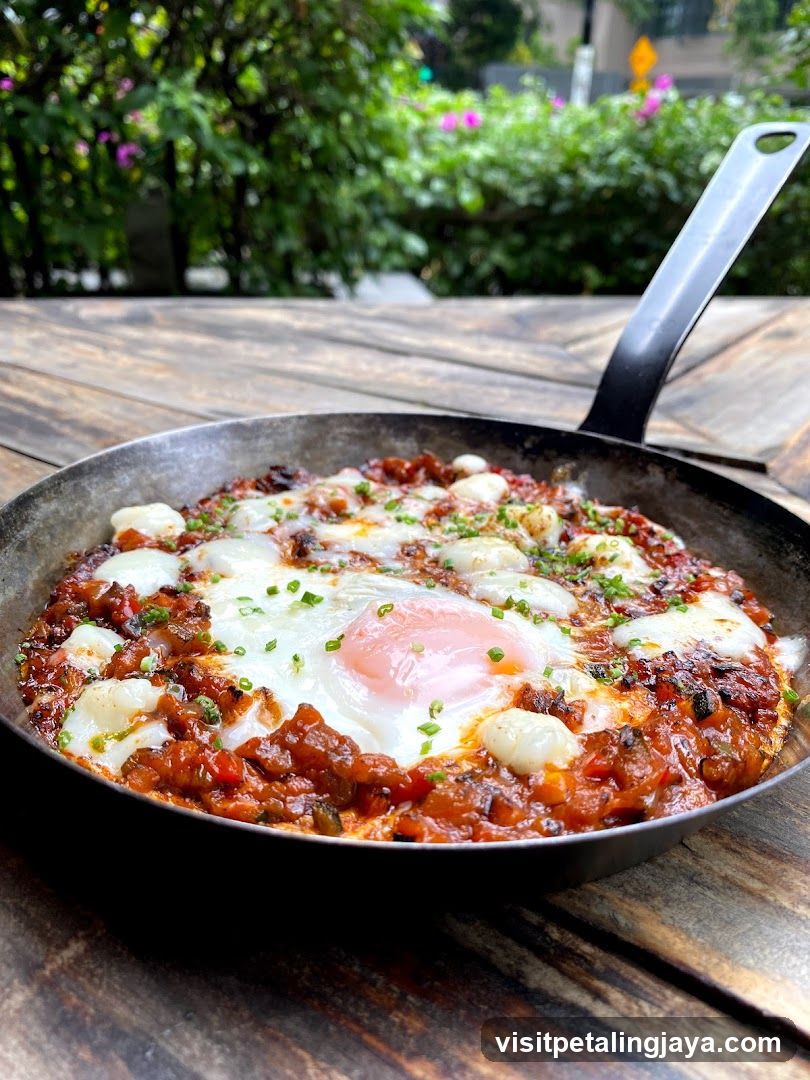 Shakshuka with Eggs in a Pan