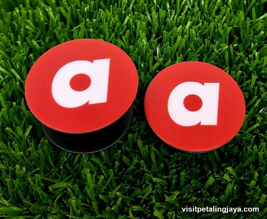Red 'a' Plugs on Grass