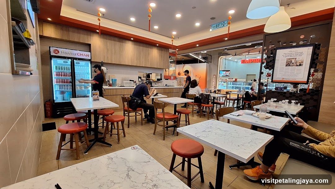 Restaurant Interior with Staff and Customers