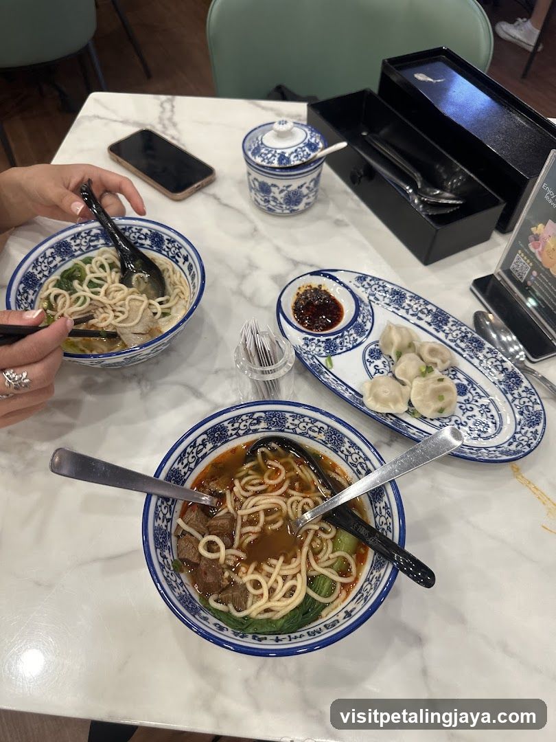 Dining Table with Noodles and Dumplings
