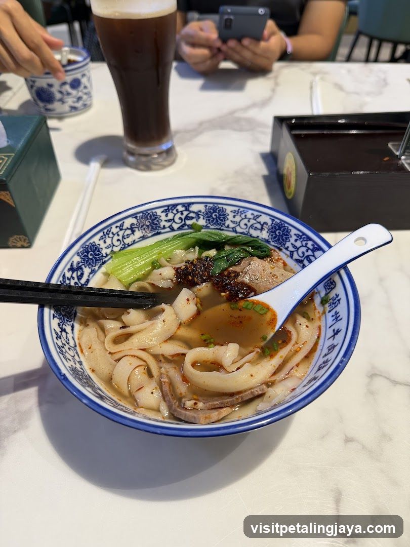 Bowl of Noodles with Broth and Vegetables