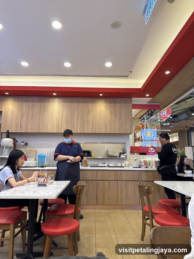 Restaurant Interior with Staff and Customers