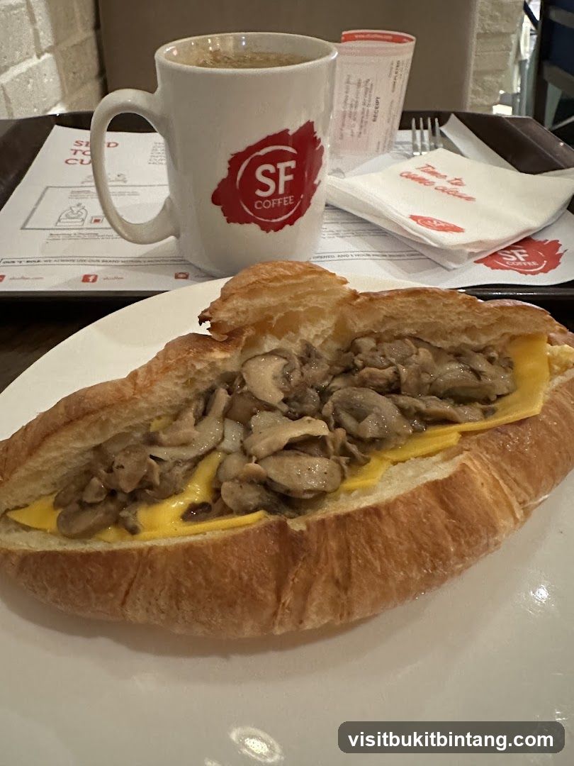 Mushroom and Cheese Croissant with Coffee