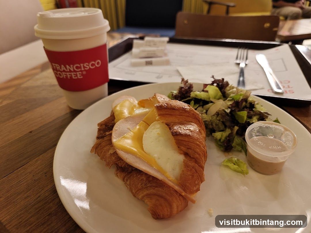 Croissant Sandwich and Coffee