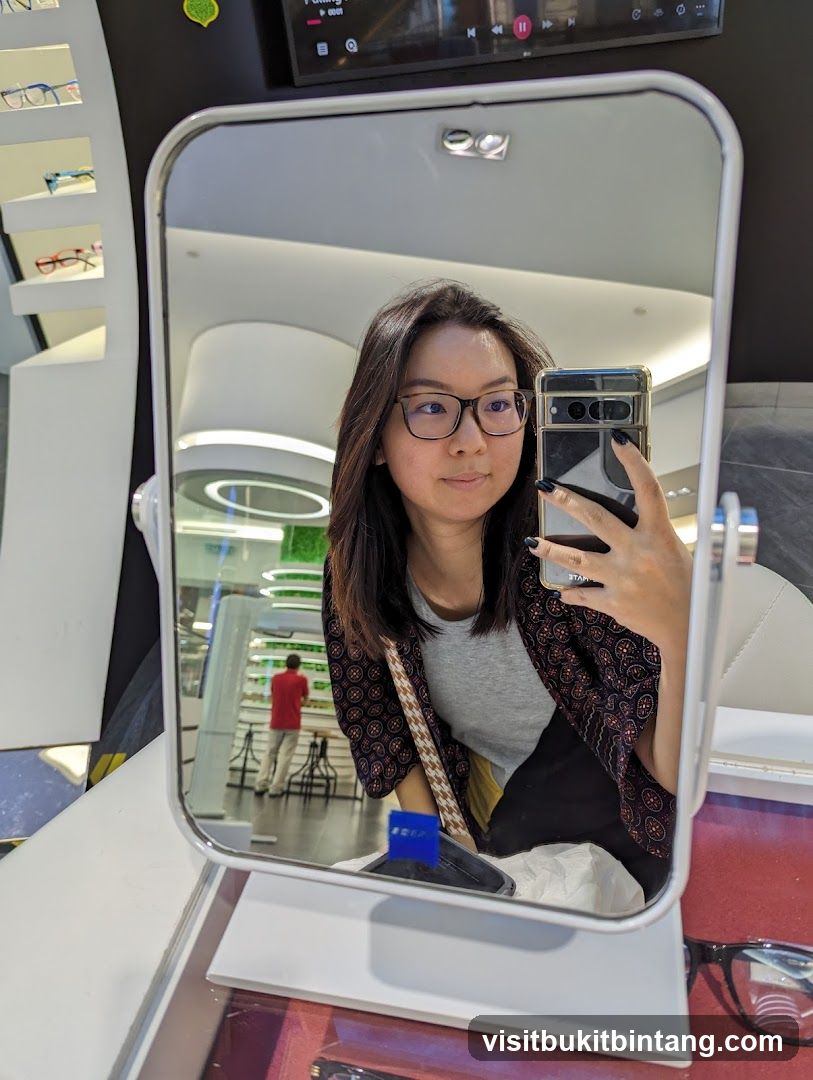 Woman taking a mirror selfie in an optical shop