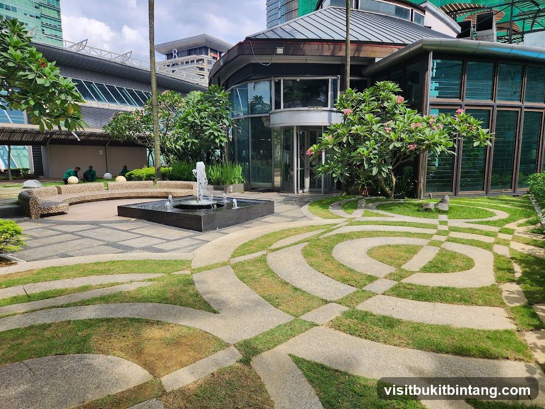 Modern Building Exterior with Fountain and Landscaping