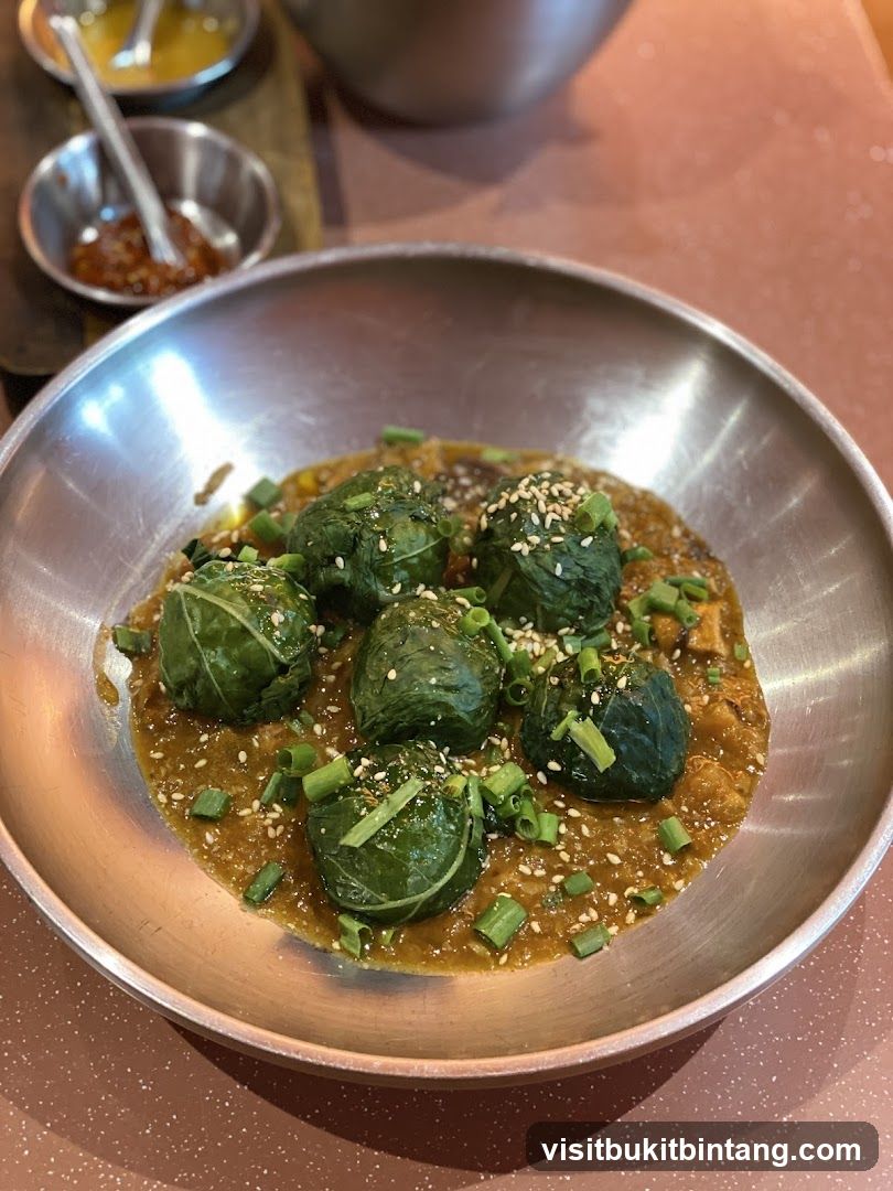 Stuffed Grape Leaves with Sauce