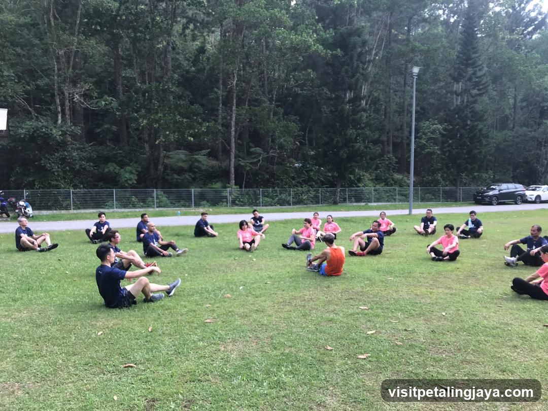 Group sitting on grass in park