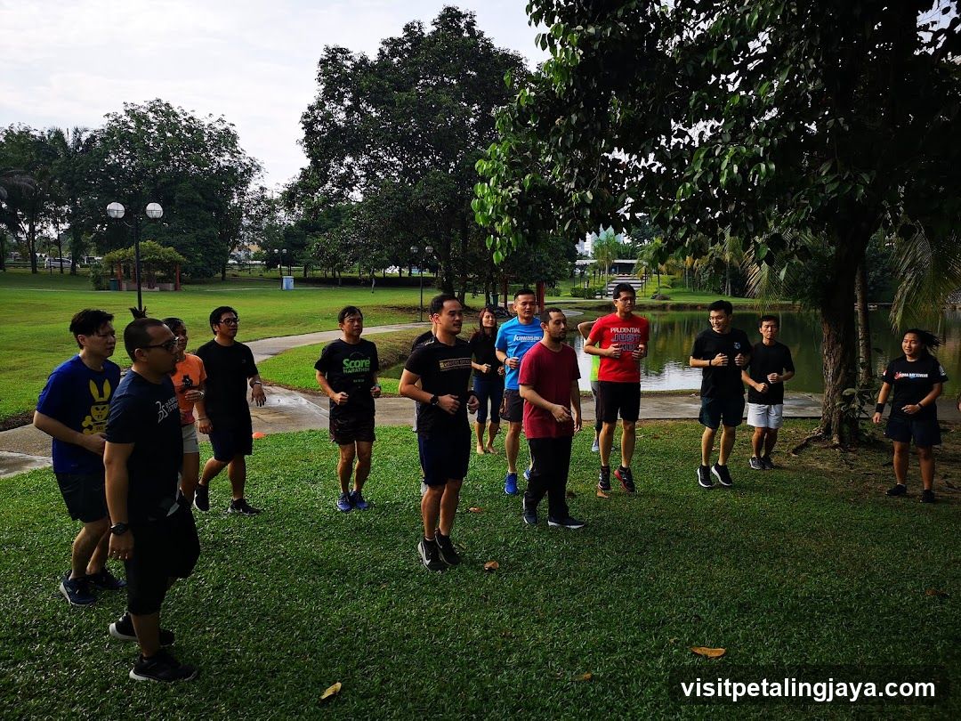Group of people jogging in a park