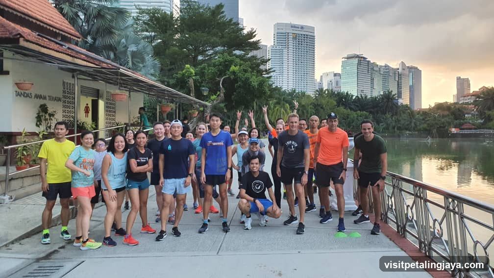 Group photo near shop with city skyline