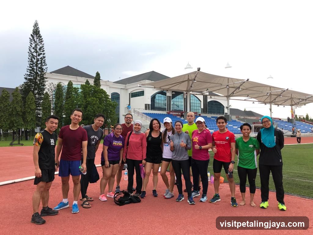 Group of people on a running track