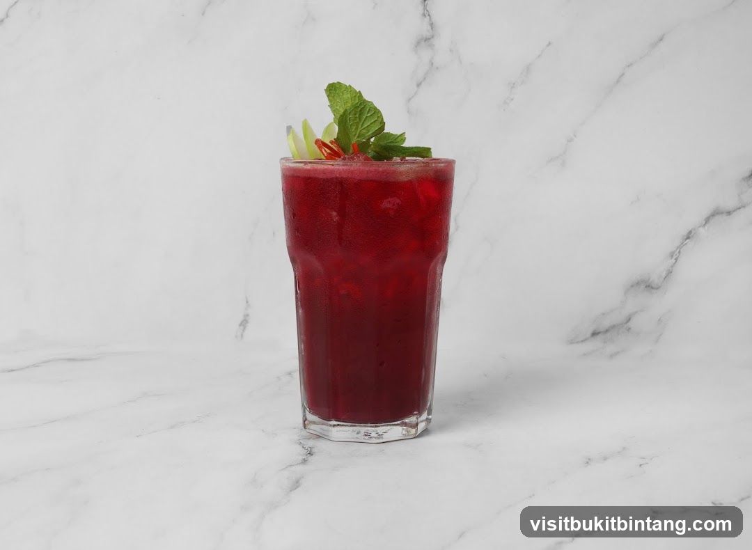 Red Iced Drink with Mint and Chili