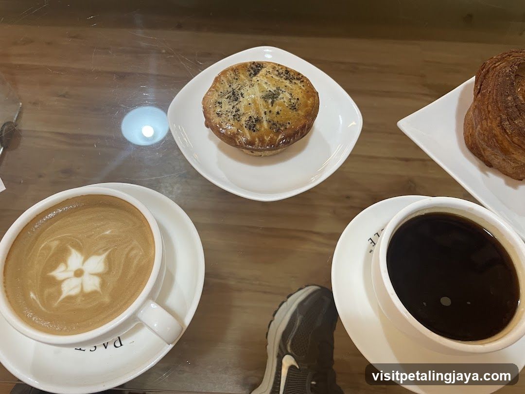 Coffee and Pastries on a Wooden Table