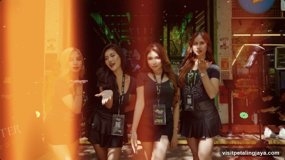 Four women posing outside a venue