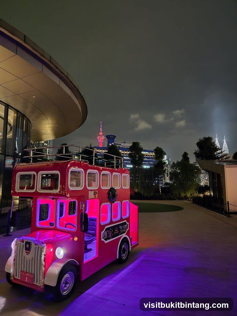 Red Double-Decker Bus Display at Night