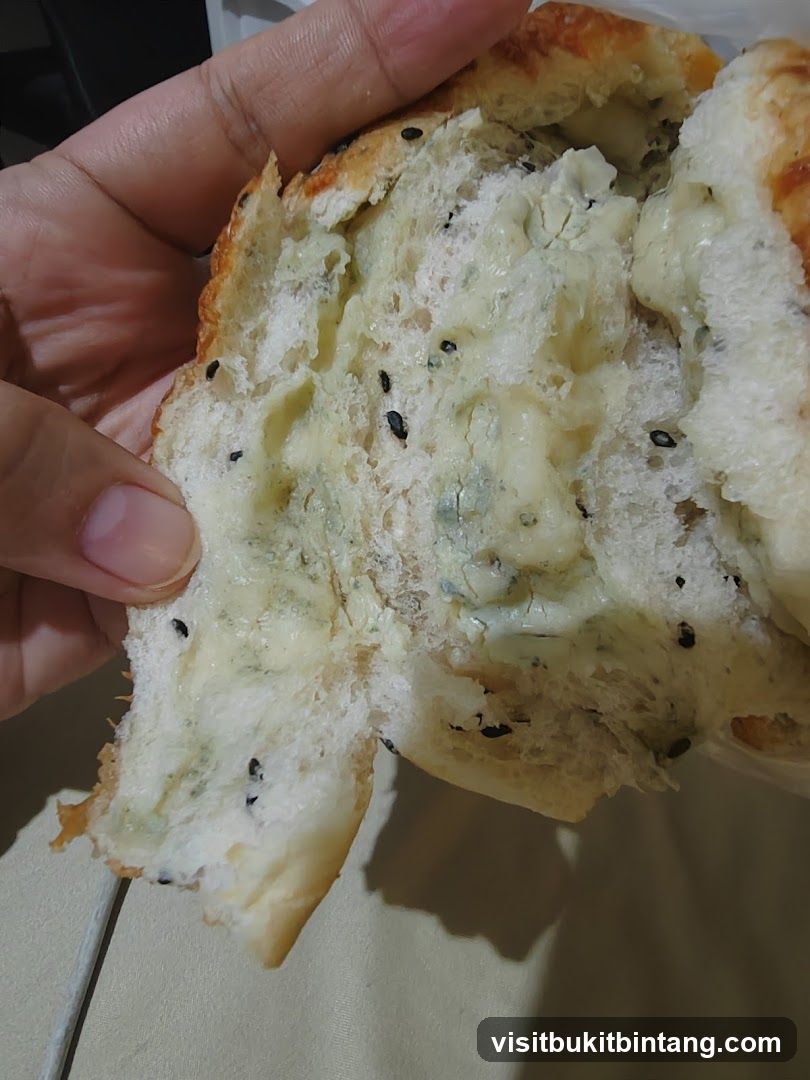 Close-up of a cheese-filled bread roll