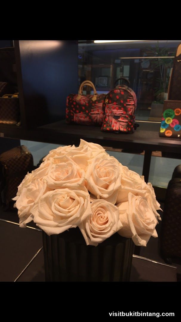 Flower Arrangement and Designer Bags