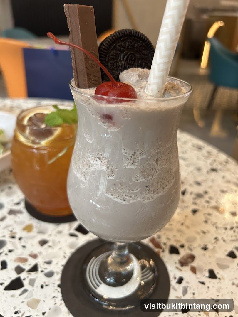 Oreo milkshake with Kit Kat and cherry