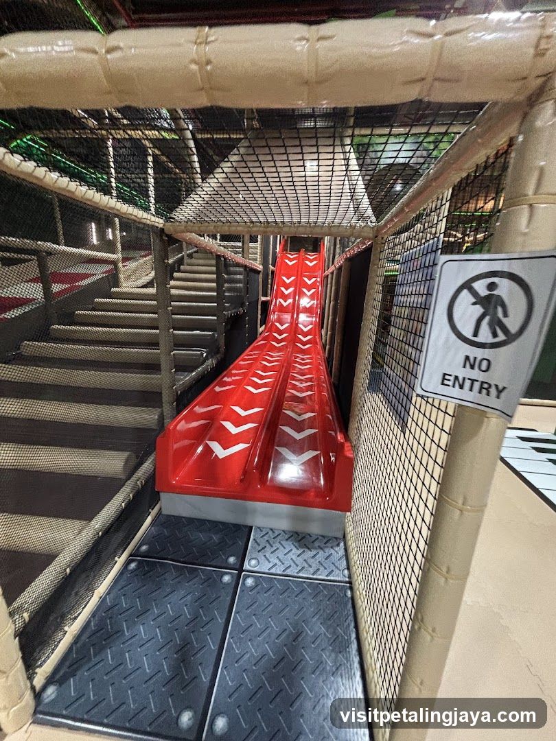 Indoor Play Area with Red Slide